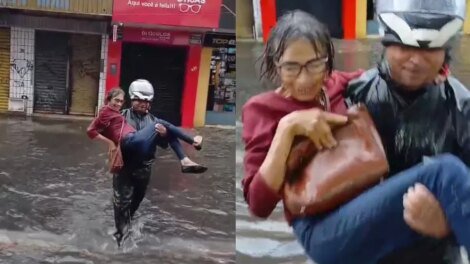 mulher-e-levada-nos-bracos-para-atravessar-rua-alagada-no-centro-de-fortaleza